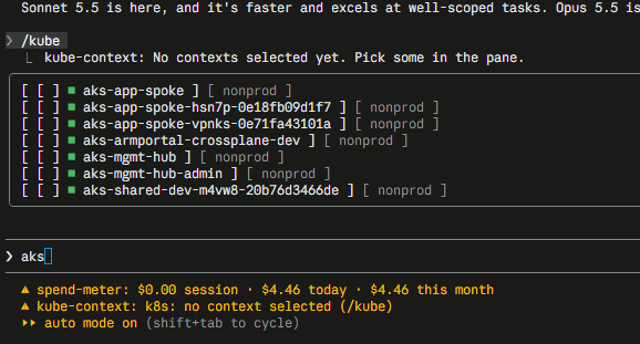 The first picker: a bordered list of contexts drawn inline above the prompt, every checkbox empty, while the word "aks" has landed in the prompt below it.